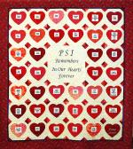 Product Description:  PSI Quilt Poster - Red Quilt 2006